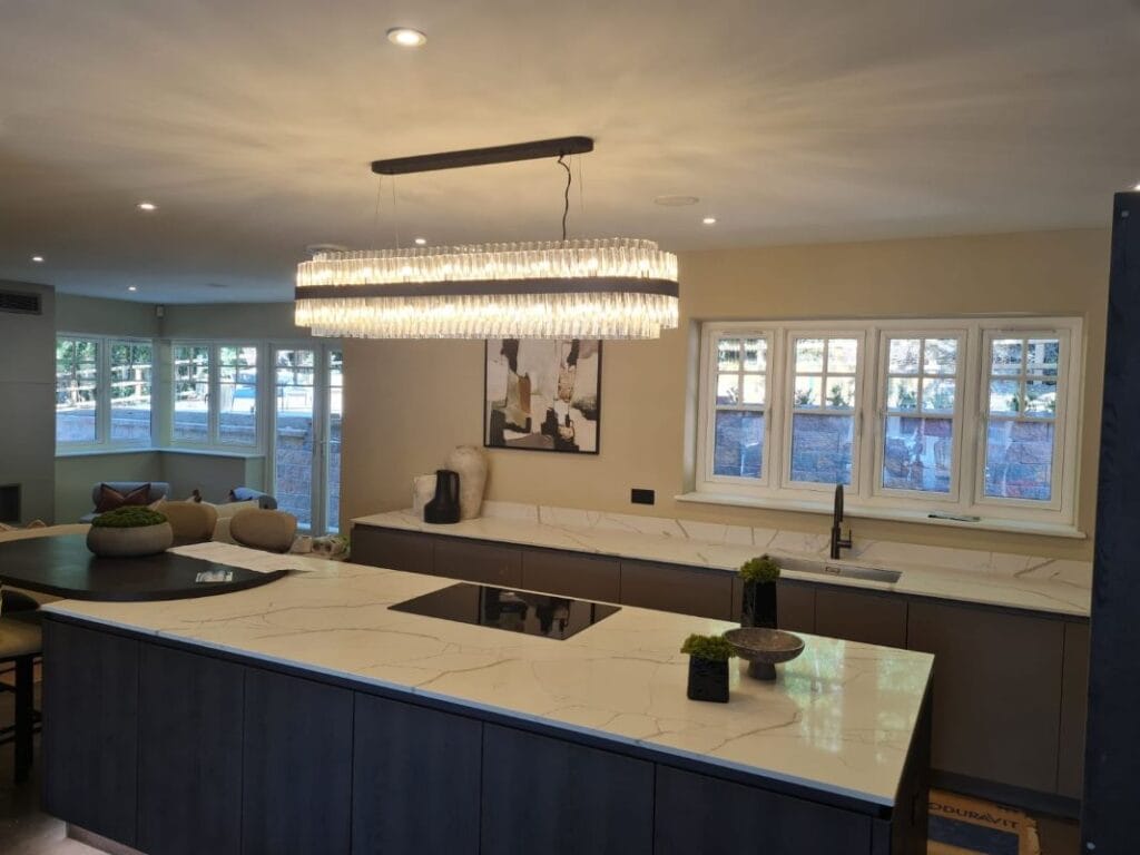 Luxury Kitchen Renovation with Island Counter and Modern Pendant Lighting
