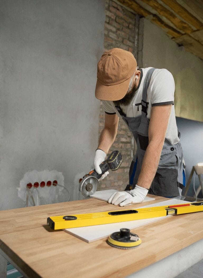 Professional Home Renovation Expert Measuring and Installing Wooden Fixtures