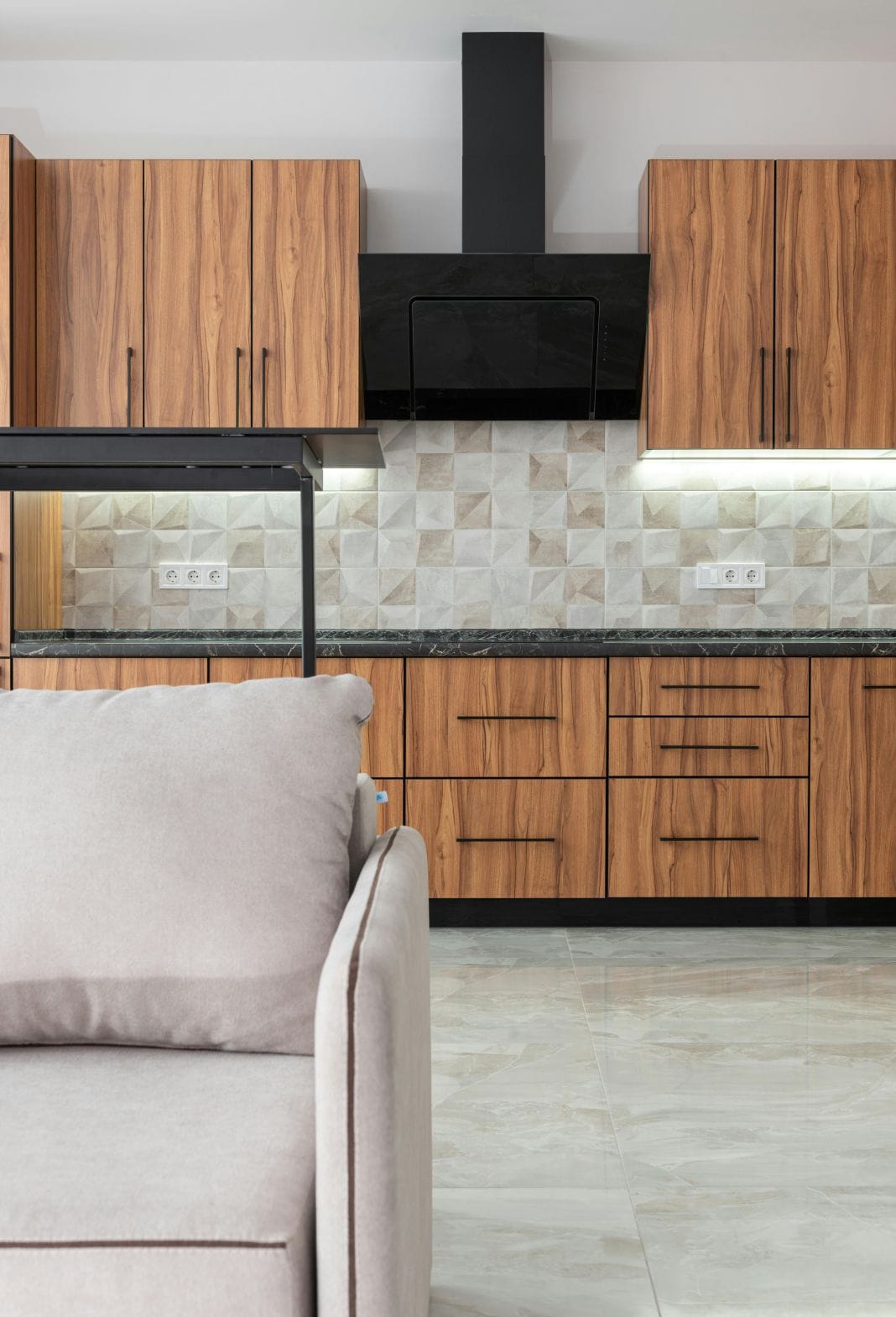 a portrait photo of a open plan living room and kitchen area