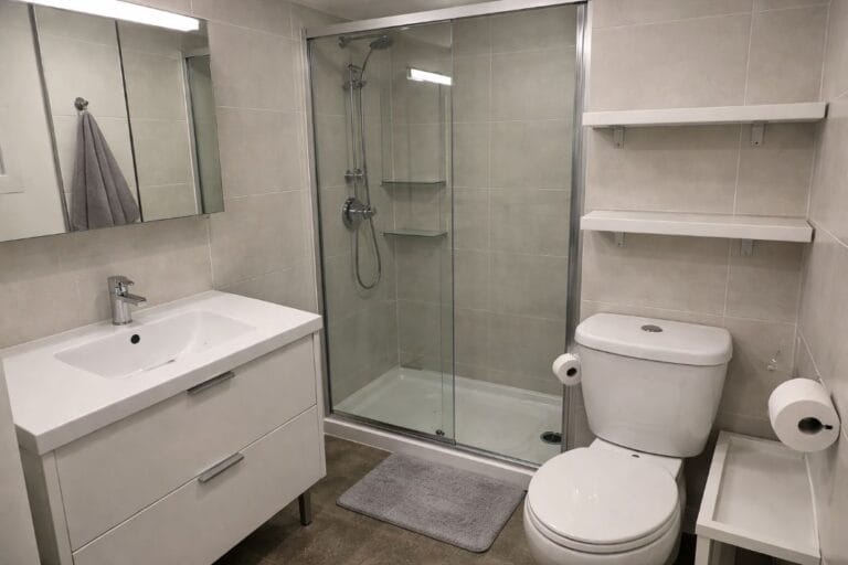 an illustrative image of a compact flat bathroom after renovation